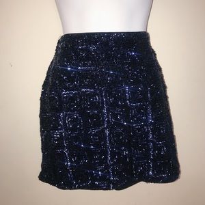 Sparkly sequined dark blue mini skirt.